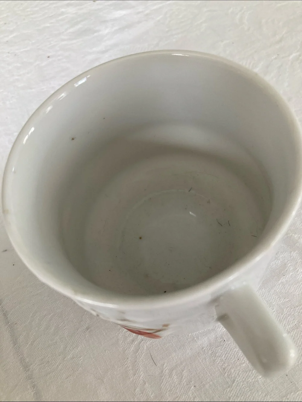 Vintage White Porcelain Cup with Gold Script and Orange Accents